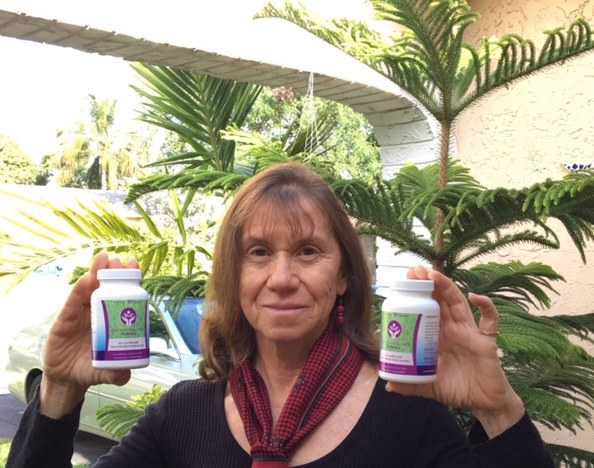 Martin Clinic customer holding two bottles of Thyroid Support Formula