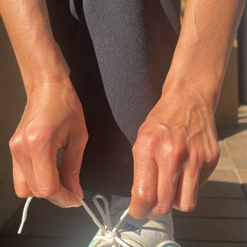 Lacing up a walking shoe